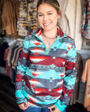 Texas Rain Fitted Pullover being styled and modeled on women in front of store setting.