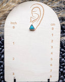 The Jamie Stud Fashion Earring Set - Silver on a measuring board, sitting on beans and wheat.