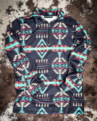 Cabin Fever Pullover displayed on cowhide.