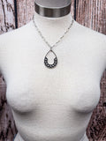 Western horseshoe teardrop pendant necklace on mannequin with chunky chain link