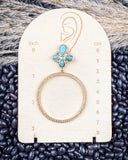 Ocean Bloom Fashion Hoops displayed on a ruler, sitting on beans and wheat.