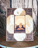 Front view of the Myra Bag - Tumbleweed Trail Photo Frame in Brown and White on a wood background.