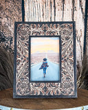 Front view of the Myra Bag - Wyburn Canyon Photo Frame on a wood background.