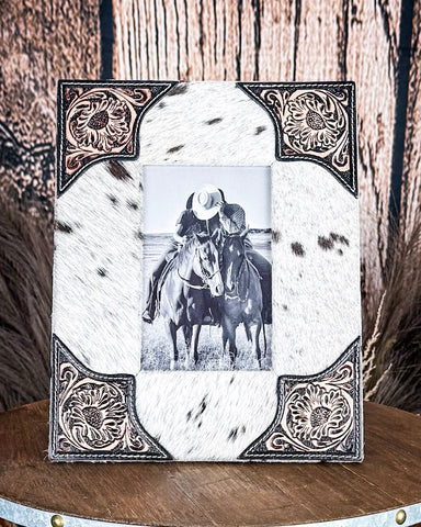 Front view of the Myra Bag - Tumbleweed Trail Photo Frame in Black and White on a wood background.