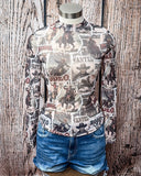 Sheer mesh top with vintage rodeo poster print displayed and styled on mannequin.