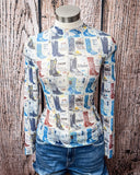 Boot Stamped Collage Mesh Top displayed and styled in front of a wood backdrop.