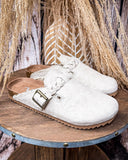 Iris Tooled Slip on Mule in Cream by Very G displayed on a wood background.
