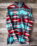 Texas Rain Fitted Pullover being displayed on wood background.