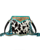 Front view of the Pony Trail Fringed Hand-Tooled Bag in a white back drop.