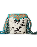 Back view of the Pony Trail Fringed Hand-Tooled Bag in a white back drop.