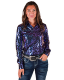 Woman wearing a shiny purple shirt and jeans on a white background