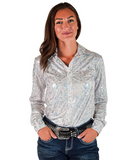 Woman wearing a silver iridescent shirt and jeans on a white background