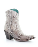 Cowboy boot with python detailing on a white background