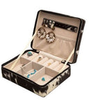 The Myra Bag - Mausoleum Jewelry Box open to show compartments and the jewelry inside in a white backdrop.
