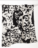 Wrangler Black & White Cowhide Stretchy Throw Blanket - Home Decor - Carstens - Bronco Western Supply Co.