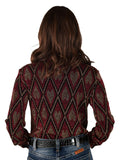 Woman wearing a red shimmer diamond print button up shirt with long sleeves