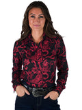 Woman wearing a black long sleeve button up shirt with red paisley print
