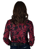 Woman wearing a black long sleeve button up shirt with red paisley print