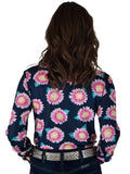 Woman wearing a navy button up shirt with pink and yellow sunflower print
