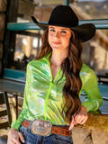 Woman wearing a neon green metallic long sleeve zip top with a subtle pattern texture