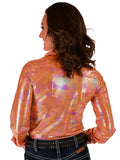 Woman wearing an orange metallic long sleeve quarter zip shirt with subtle pattern texture