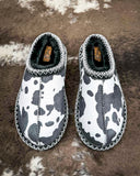 Very G black and white cow print slippers with faux fur lining and durable non-slip sole, cozy western women’s indoor outdoor shoes
