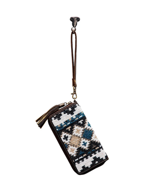 A small zippered pouch with a geometric beaded pattern in black, white, teal, and beige, featuring a brown leather wrist strap and tassel, shown against a plain white background.