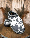 Very G black and white cow print slippers with faux fur lining and durable non-slip sole, cozy western women’s indoor outdoor shoes