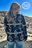 Women modeling and styling Cabin Fever Pullover in desert.