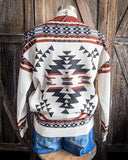 Lean On Me Knit Sweater displayed and styled on mannequin in front of wood background.