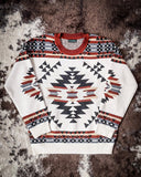 Lean On Me Knit Sweater displayed on cowhide.