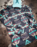 Cabin Fever Pullover displayed and styled on cowhide.