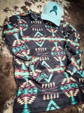 Cabin Fever Pullover displayed and styled on cowhide.