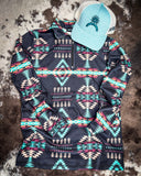 Cabin Fever Pullover displayed and styled on cowhide.