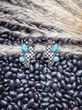 Earrings styled on beans and wheat.

