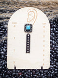 Western stud drop earring with turquoise square on size card.