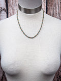 Western beaded necklace displayed on a mannequin 