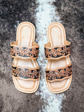 Matching pair of handcrafted western sandals with double floral tooled straps and cushioned insoles.