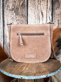 Back of suede crossbody bag with zipper pocket and MYRA logo patch