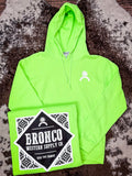 Flat lay of neon green Havasu Hoodie with folded back graphic and front chest logo