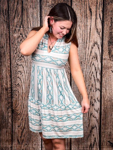 Close-up of front and side of Desert Skies Sleeveless Dress by Lucky & Blessed.