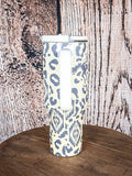 Back view of handle western tumbler with tribal pattern
