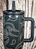 Tumbler with straw lid and western stitch design.

