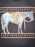 Close up graphic of blue roan horse on the tee