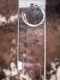Hoop shown on a ruler to show the size