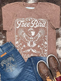 Styled flat lay of the Free Bird Graphic Tee with Cowgirl Tuff Jeans and Twisted X shoes.