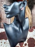 stud earrings on mannequin