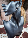 stirrup earring on mannequin 