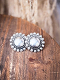 earrings on wood