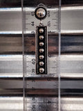 earrings on ruler